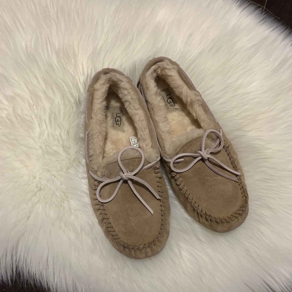 beige fluffy ugg slippers